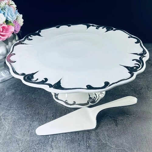 666-398 (в уп.2шт.) - Тортовница 31см на ножке с л [01106147] 666-398 (в уп.2шт.) - Тортовница 31см на ножке с лопаткой ARGENTO в под.упаковке, материал: фарфор.