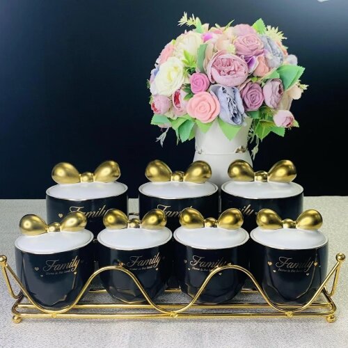 106-207 (в уп.4наб.) - Набор из 7 банок для сыпучи [01106003] 106-207 (в уп.4наб.) - Набор из 7 банок для сыпучих на подставке в подарочной упаковке, материал: фарфор.